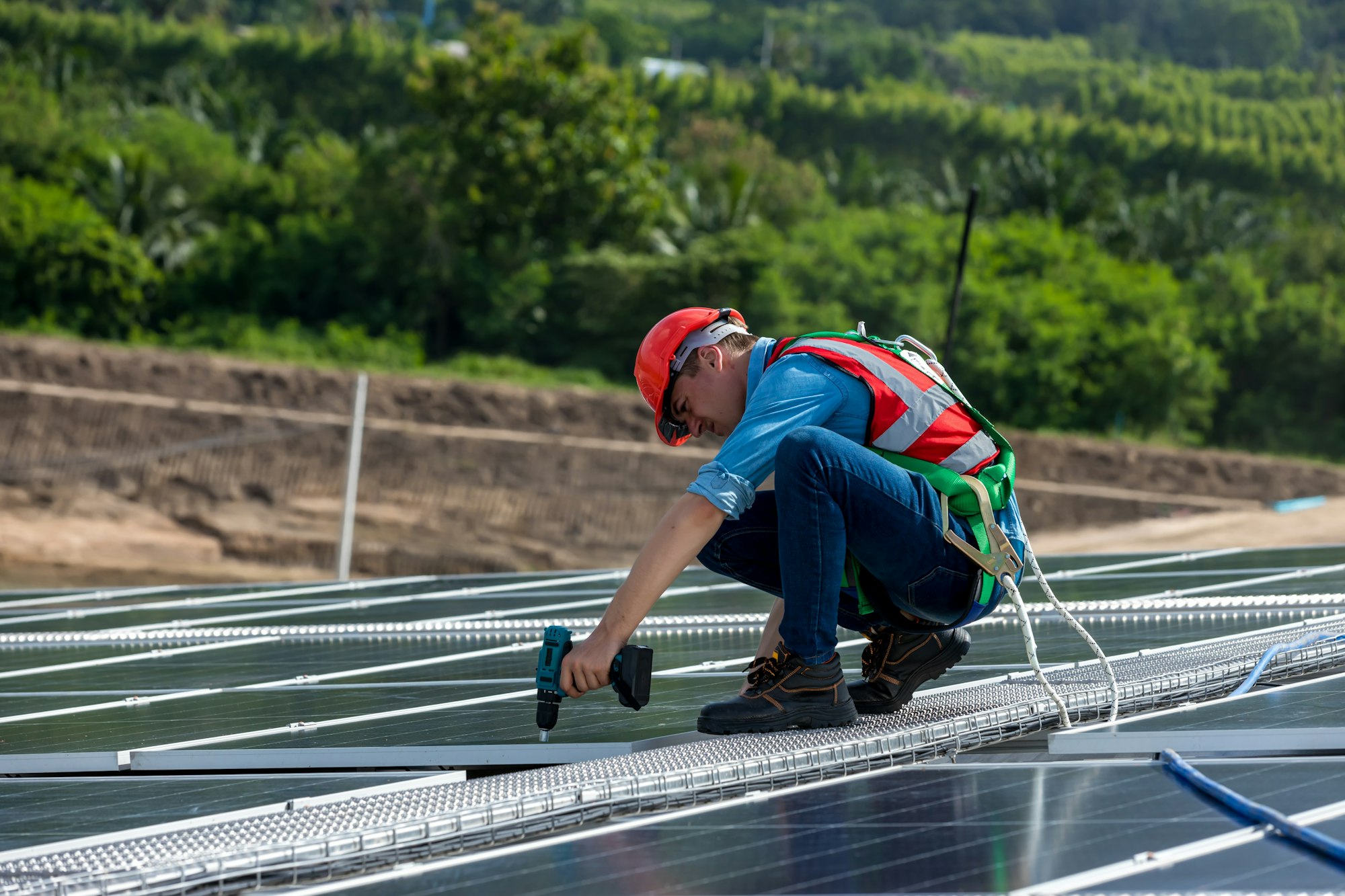 Engineer working setup Solar panel at the roof top