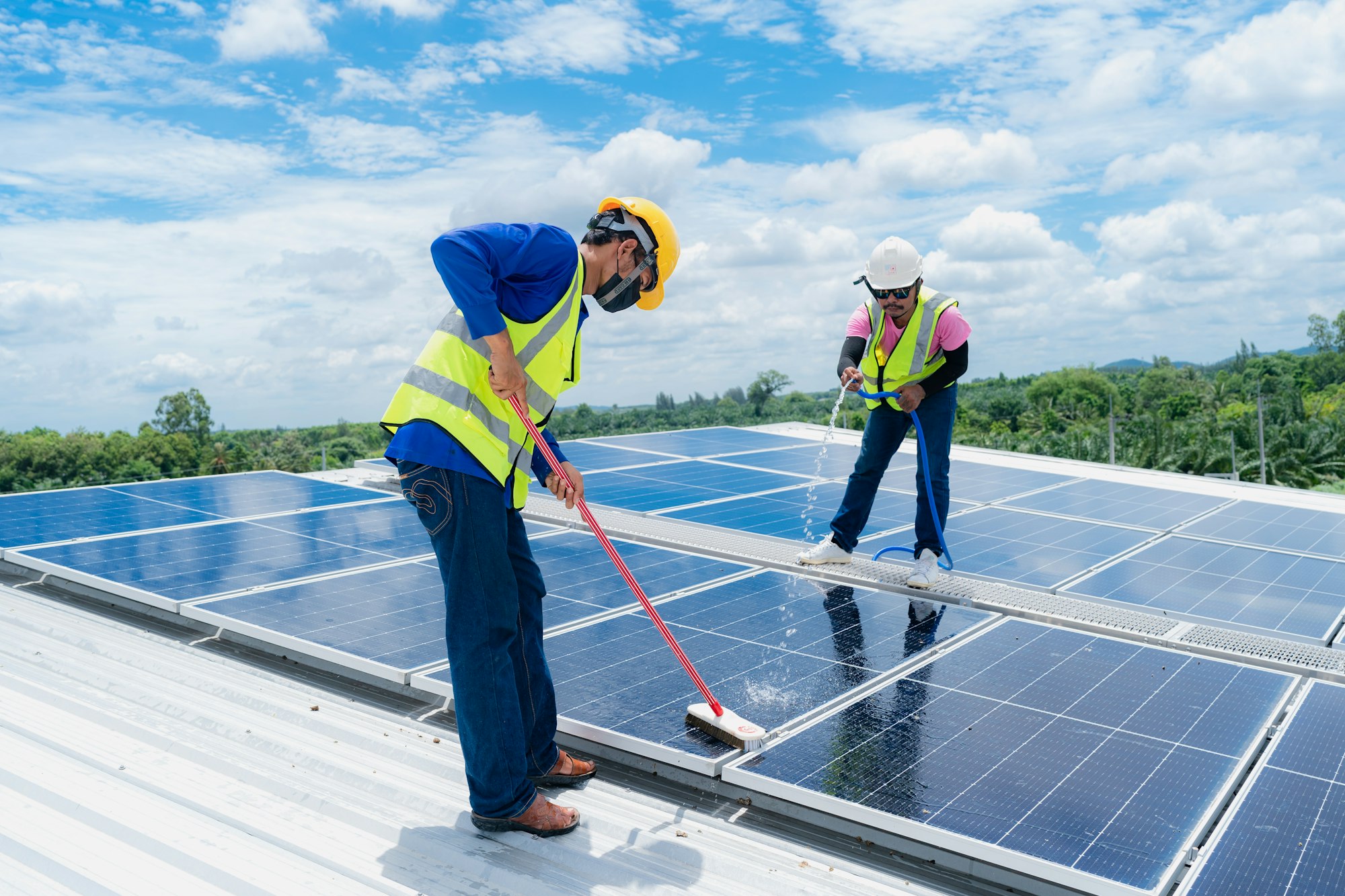 Solar roof cleaning, Professional technicians were washing and the surface of the solar panels